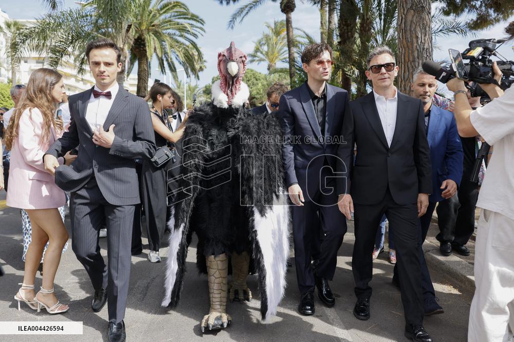 Cannes Raphael Quenard, Francois Civil, Michel Hazanavicius walk with condor from Hotel Martinez MP