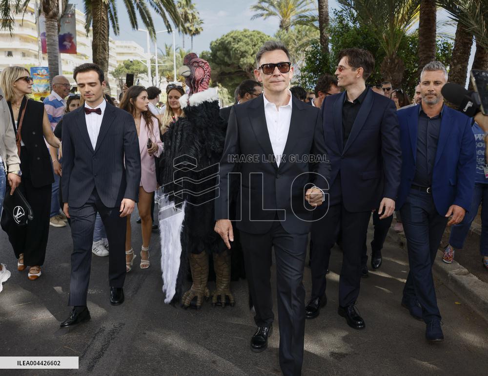 Cannes Raphael Quenard, Francois Civil, Michel Hazanavicius walk with condor from Hotel Martinez MP