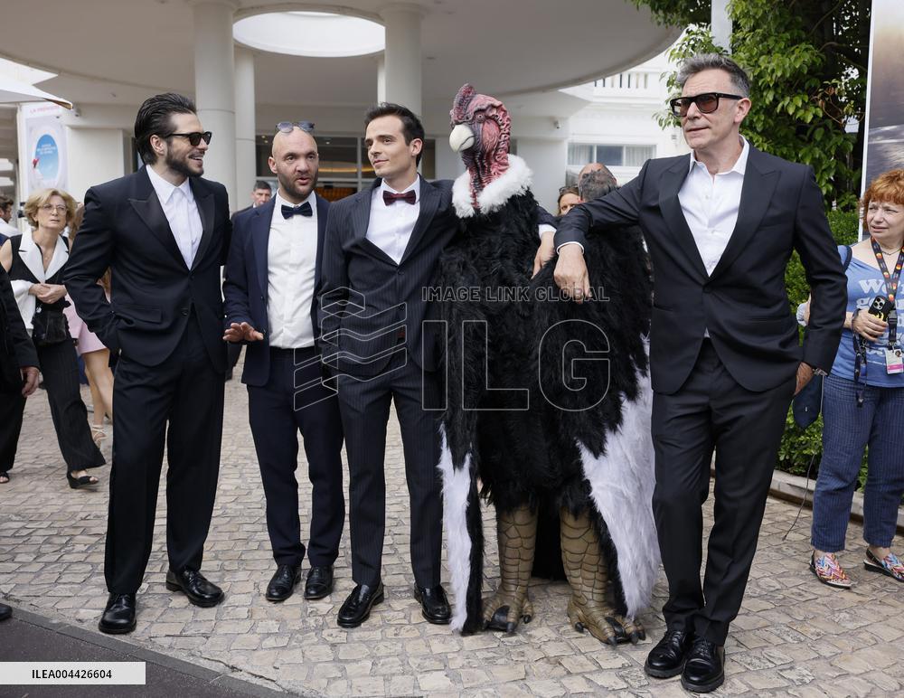 Cannes Raphael Quenard, Francois Civil, Michel Hazanavicius walk with condor from Hotel Martinez MP
