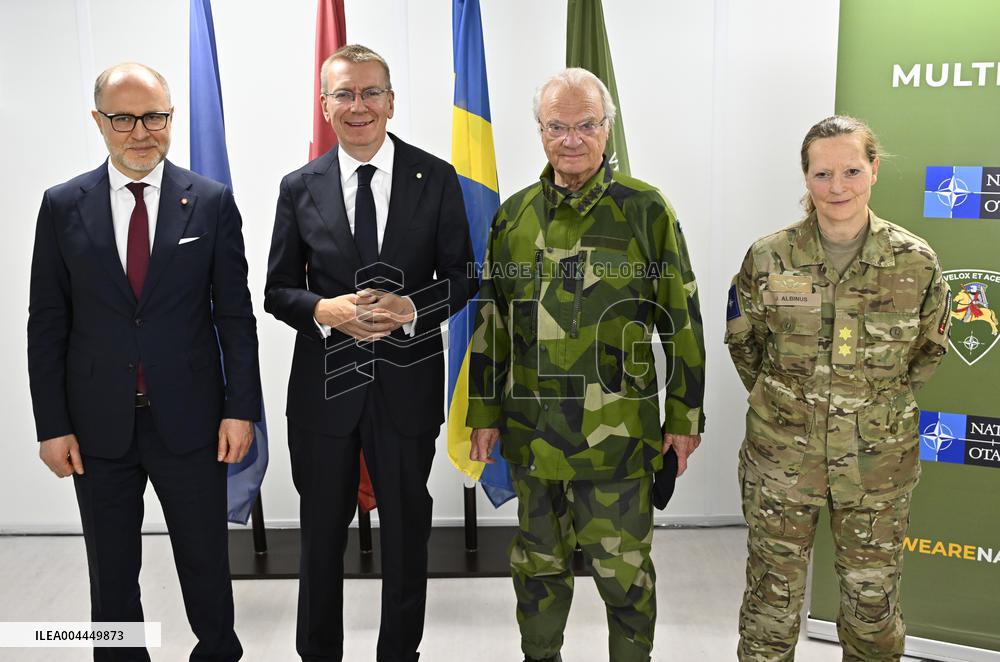KING CARL GUSTAF VISITS SWEDISH NATO SOLDIERS