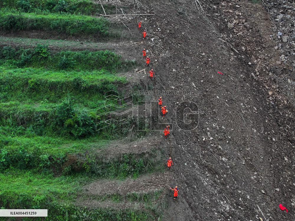 Nearly a Dozen Trapped in Landslides in Southwest China