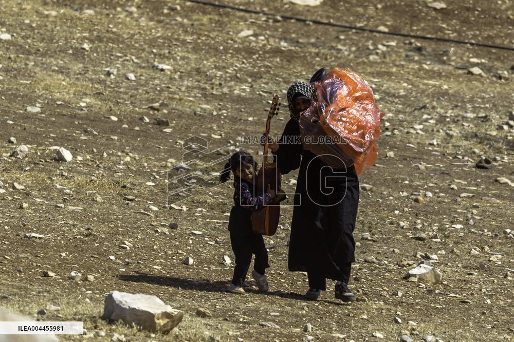 Settlers' Harrasement Forces Palestinians to Leave