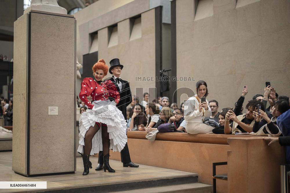 Moulin Rouge dancers perform at the Musee d'Orsay