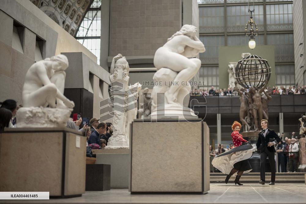Moulin Rouge dancers perform at the Musee d'Orsay