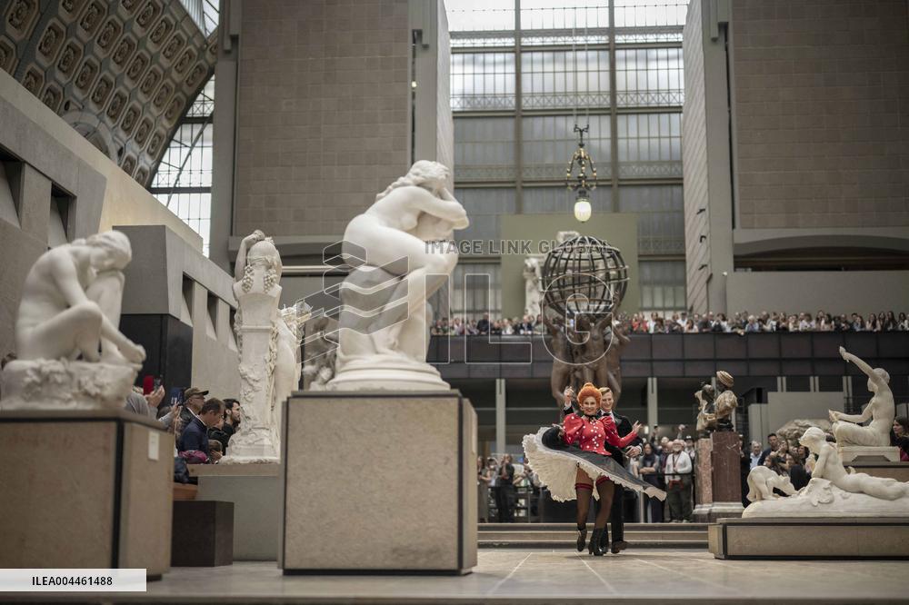 Moulin Rouge dancers perform at the Musee d'Orsay