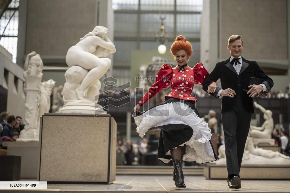 Moulin Rouge dancers perform at the Musee d'Orsay