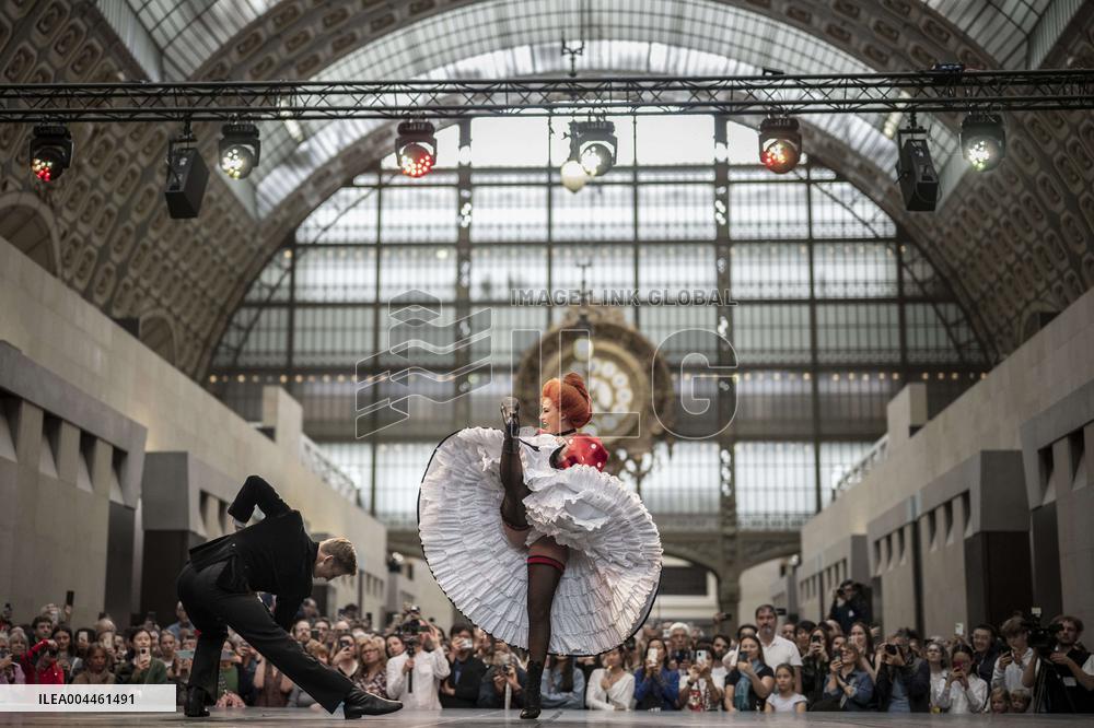 Moulin Rouge dancers perform at the Musee d'Orsay