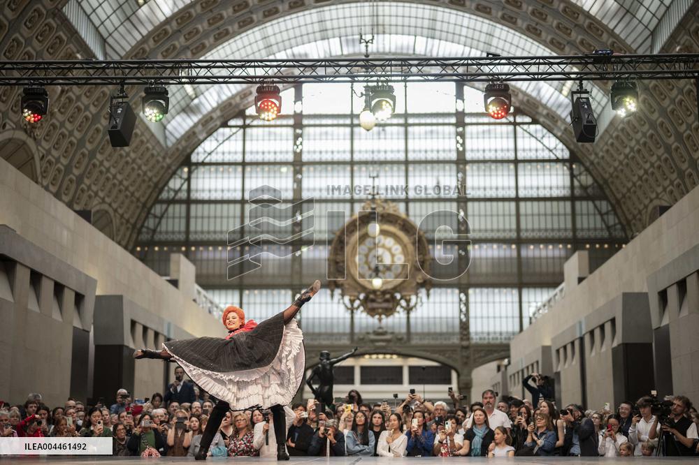 Moulin Rouge dancers perform at the Musee d'Orsay