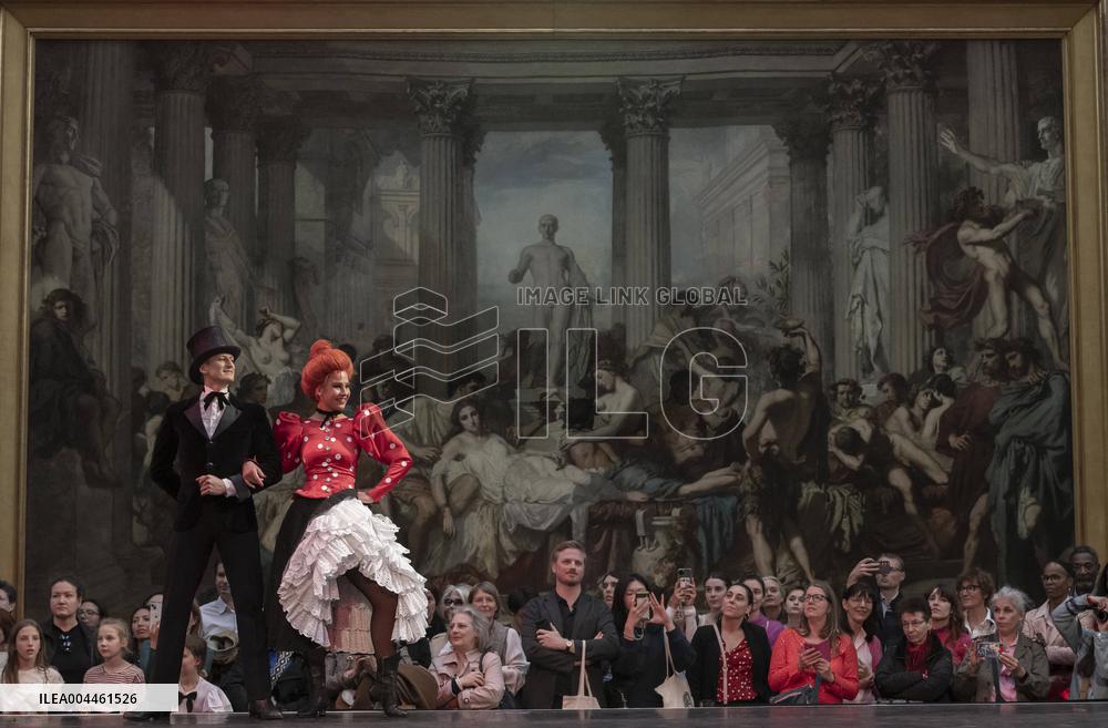 Moulin Rouge dancers perform at the Musee d'Orsay