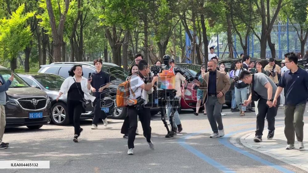 Winner of world's first humanoid half marathon