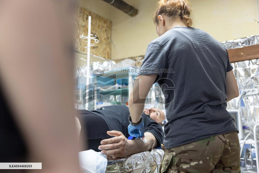 Ukrainian Medics Assist Wounded Soldier in Kharkiv