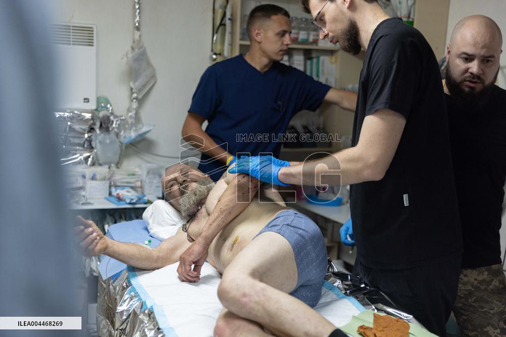Ukrainian Medics Assist Wounded Soldier in Kharkiv