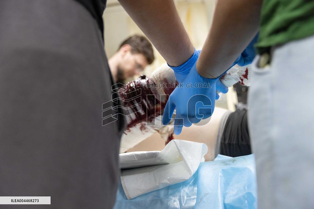 Ukrainian Medics Assist Wounded Soldier in Kharkiv