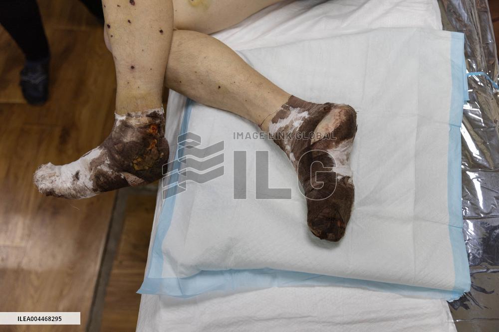 Ukrainian Medics Assist Wounded Soldier in Kharkiv