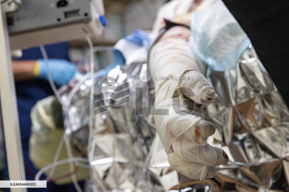 Ukrainian Medics Assist Wounded Soldier in Kharkiv