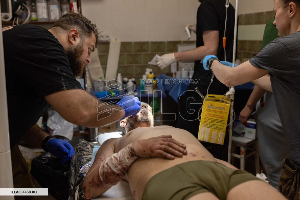 Ukrainian Medics Assist Wounded Soldier in Kharkiv