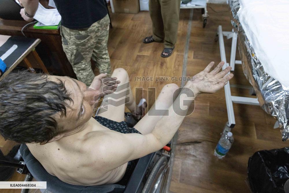 Ukrainian Medics Assist Wounded Soldier in Kharkiv