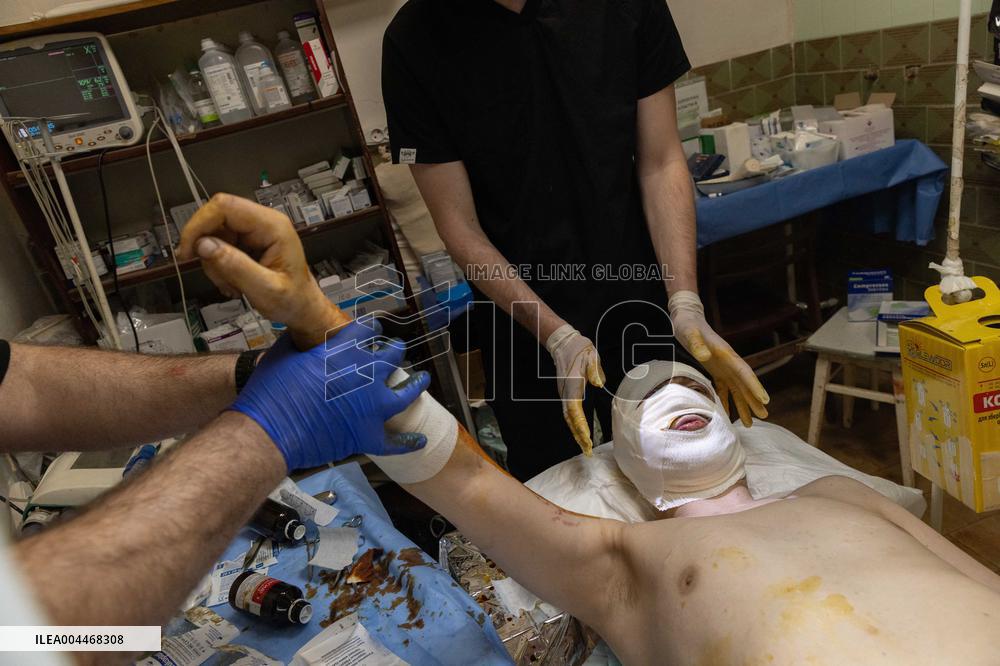 Ukrainian Medics Assist Wounded Soldier in Kharkiv