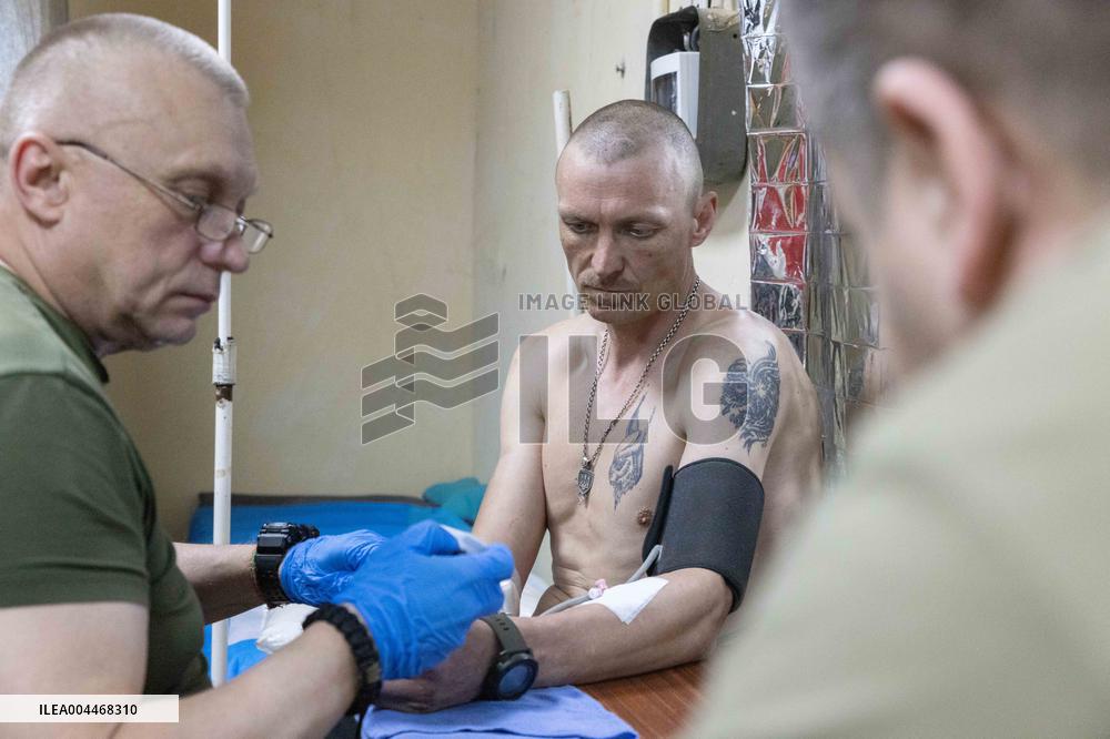Ukrainian Medics Assist Wounded Soldier in Kharkiv