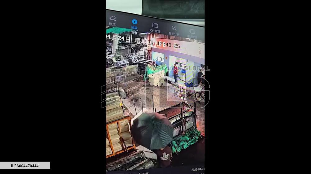 China: Workers Caught in Sudden Downpour as Awning Collapses in Guangzhou