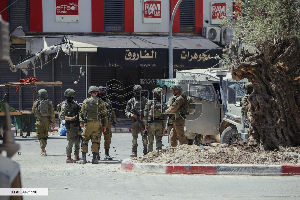 Israeli Forces Raid Financial Sites in Jenin - Palestine
