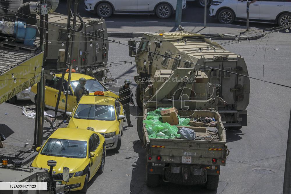 Israeli Forces Raid Financial Sites in Jenin - Palestine