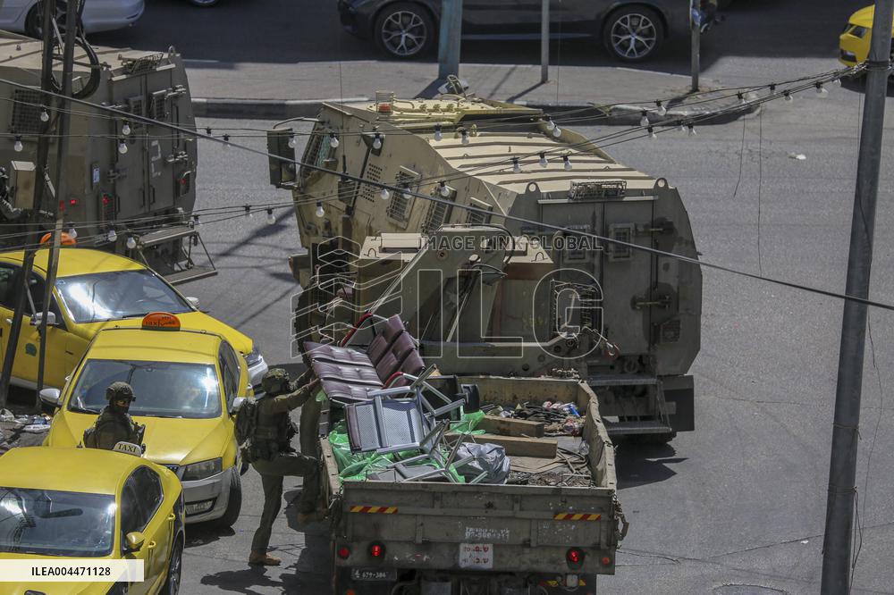 Israeli Forces Raid Financial Sites in Jenin - Palestine