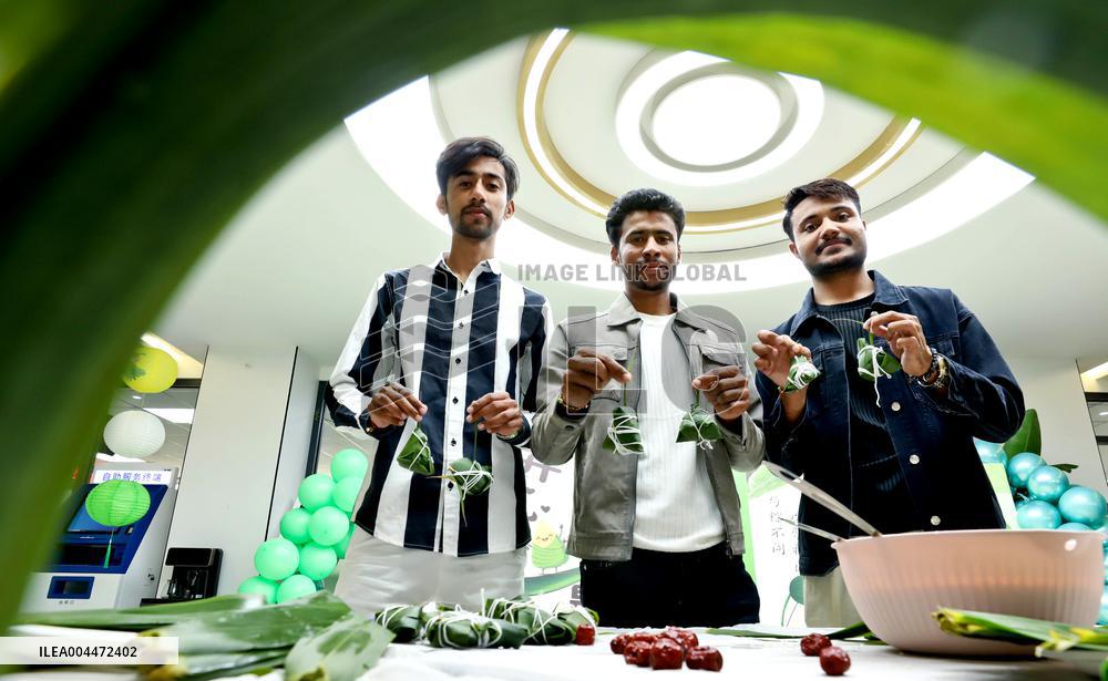 Foreigners Experience China Dragon Boat Festival