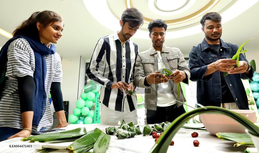 Foreigners Experience China Dragon Boat Festival