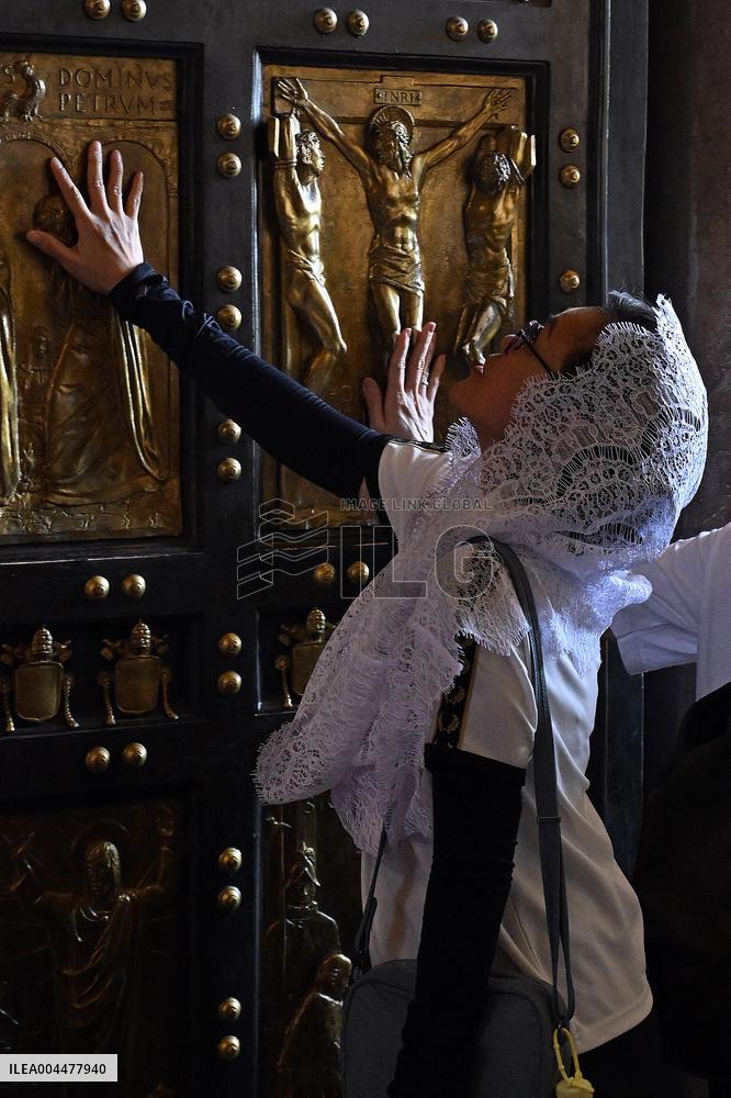 Pilgrims Walk Through the Holy Door of St. Peter s Basilica - Vatican