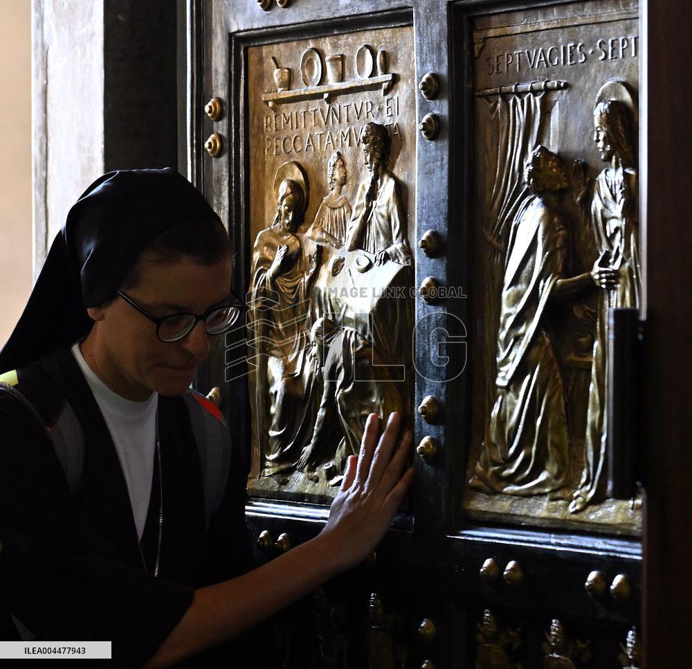 Pilgrims Walk Through the Holy Door of St. Peter s Basilica - Vatican