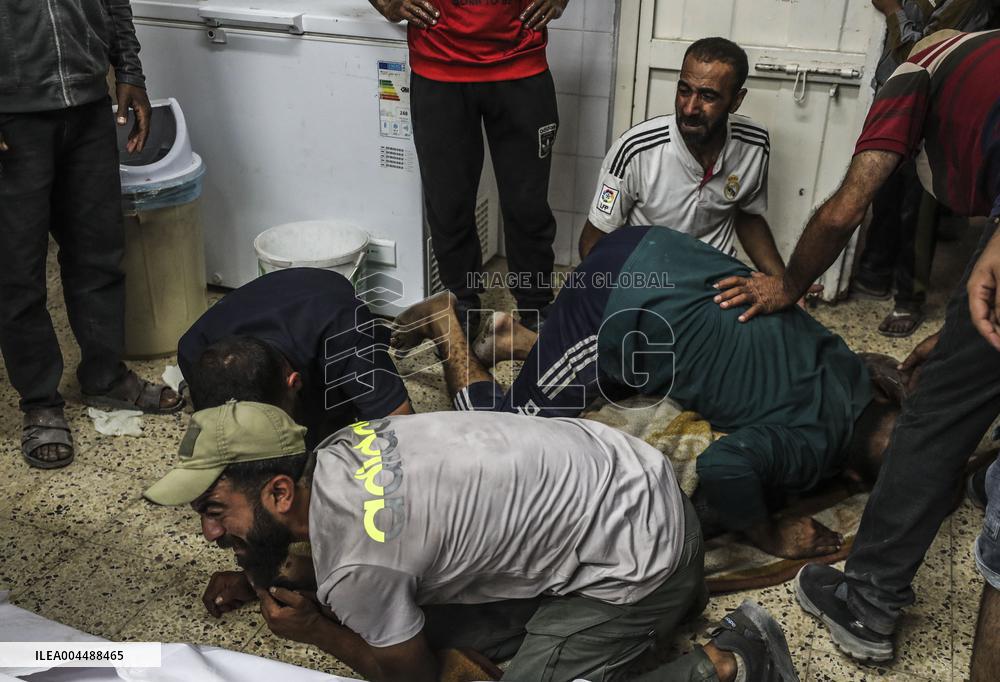 Palestinian Man Mourns Airstrike Victim - Gaza