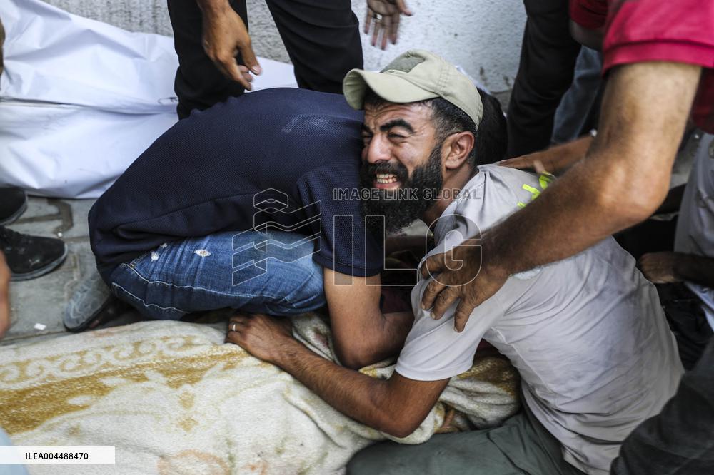 Palestinian Man Mourns Airstrike Victim - Gaza