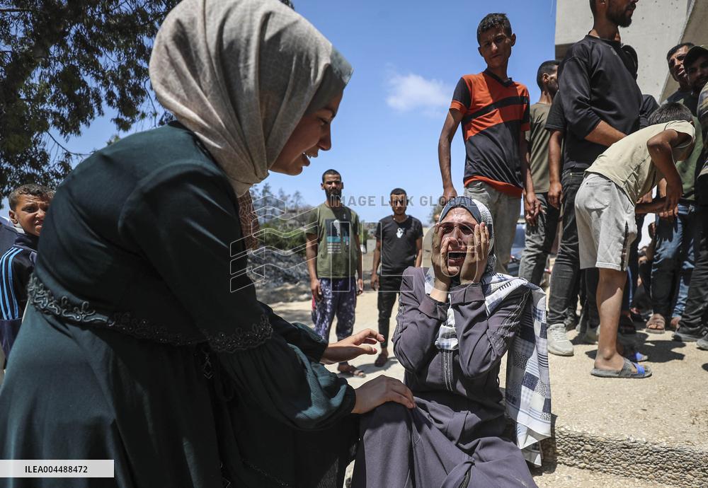 Palestinian Man Mourns Airstrike Victim - Gaza