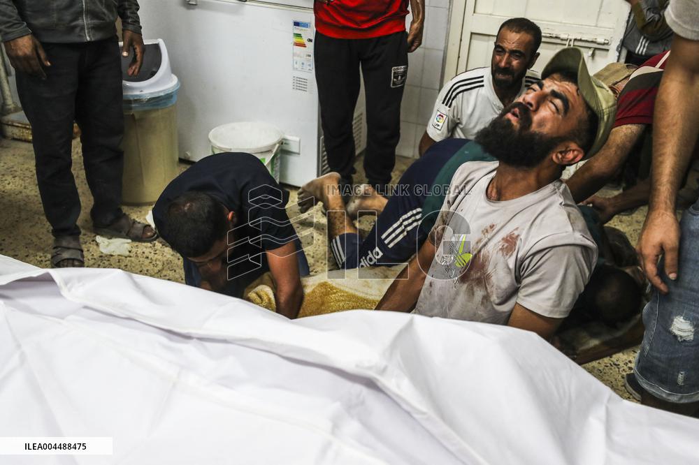 Palestinian Man Mourns Airstrike Victim - Gaza
