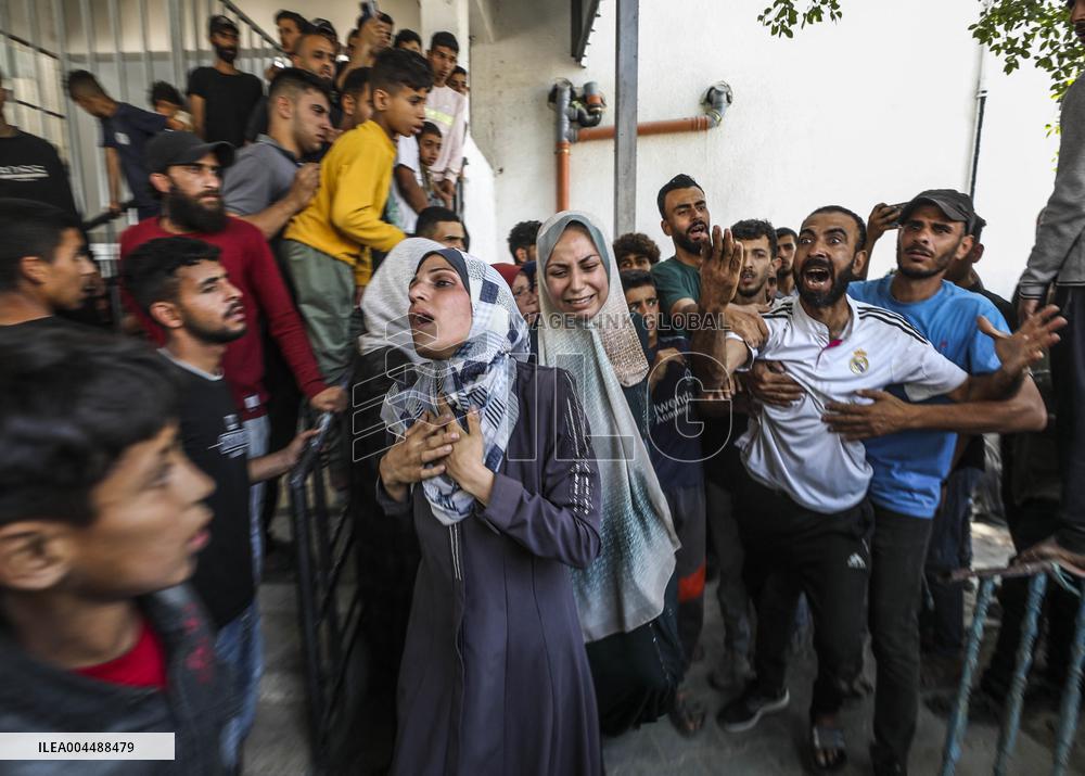 Palestinian Man Mourns Airstrike Victim - Gaza