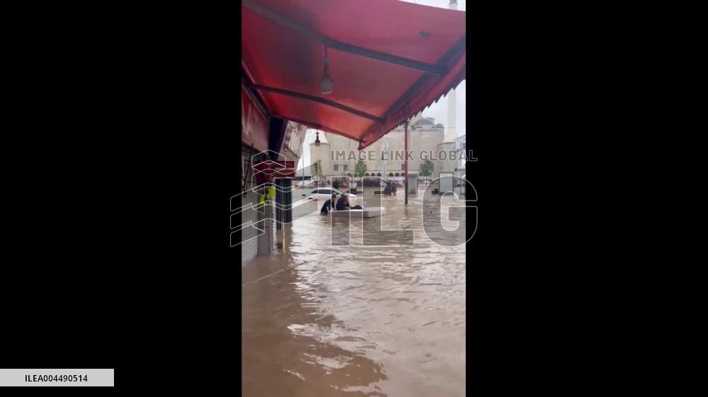 Turkey: Man Rides Mattress Through Flooded Streets in Trabzon, Drawing Laughter