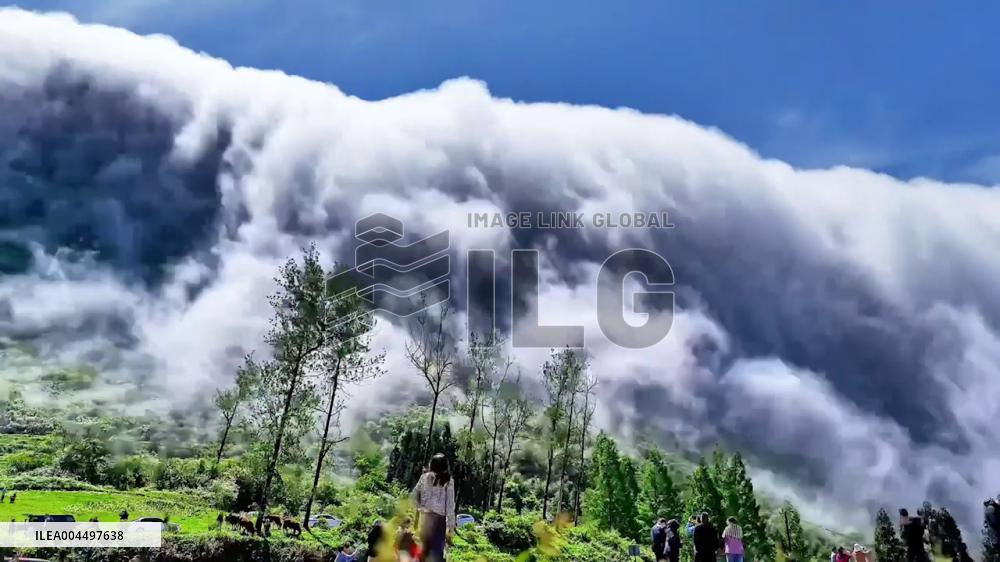 China: Cloud Fall Cascades Over Nanchuan’s Jinfo Mountain