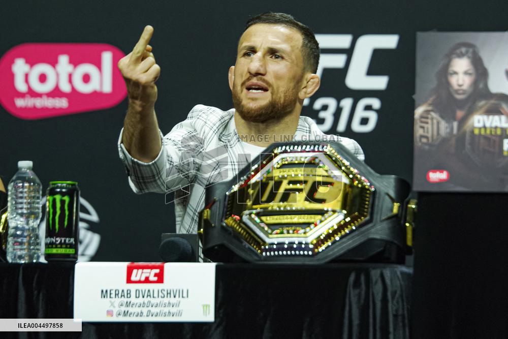 Merab Dvalishvili Gestures During the UFC 316 Press Conference