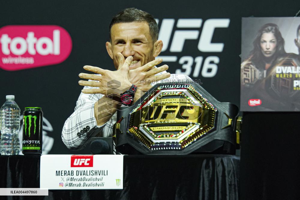 Merab Dvalishvili Gestures During the UFC 316 Press Conference