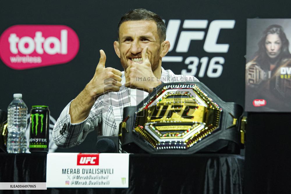Merab Dvalishvili Gestures During the UFC 316 Press Conference