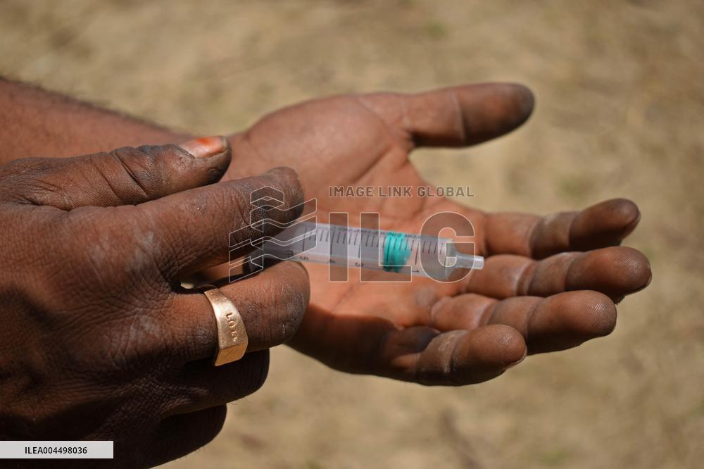 People Recycle Plastic Bottles - India