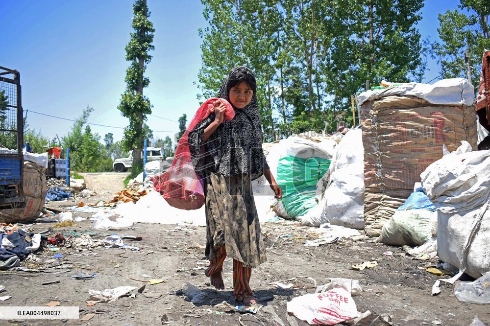 People Recycle Plastic Bottles - India
