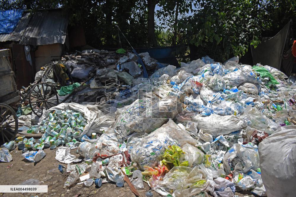 People Recycle Plastic Bottles - India