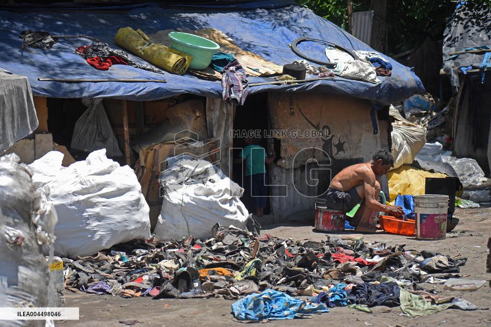 People Recycle Plastic Bottles - India