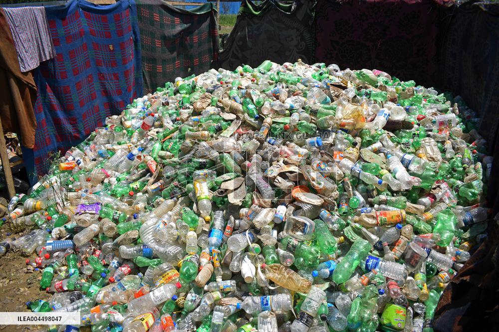 People Recycle Plastic Bottles - India