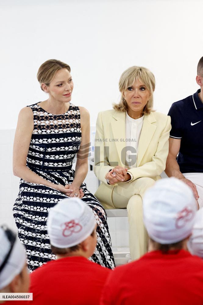 NO TABLOIDS - Brigitte Macron and Princess Charlene at the Water Safety Day Event