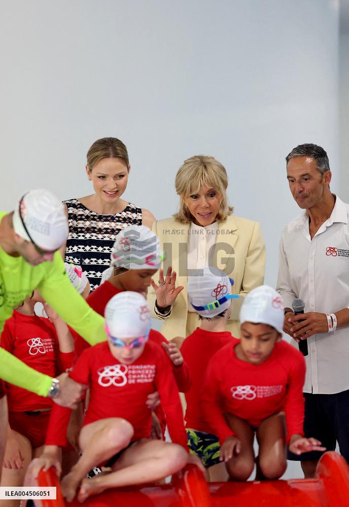 NO TABLOIDS - Brigitte Macron and Princess Charlene at the Water Safety Day Event