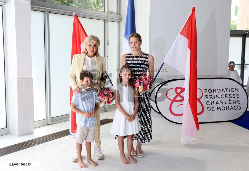 NO TABLOIDS - Brigitte Macron and Princess Charlene at the Water Safety Day Event
