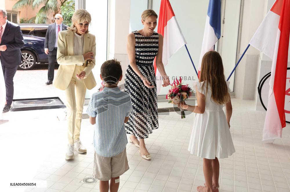 NO TABLOIDS - Brigitte Macron and Princess Charlene at the Water Safety Day Event